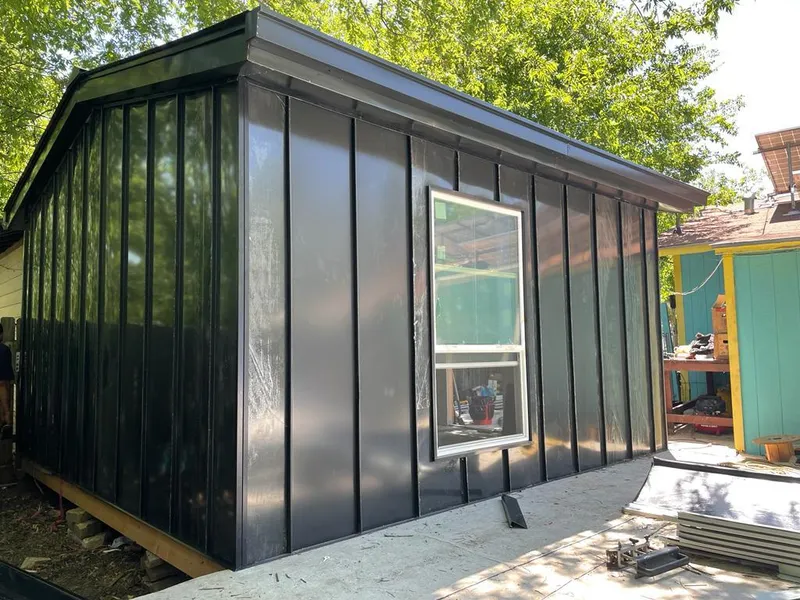 Black standing seam metal wall panels for Roof Inspection in Pueblo