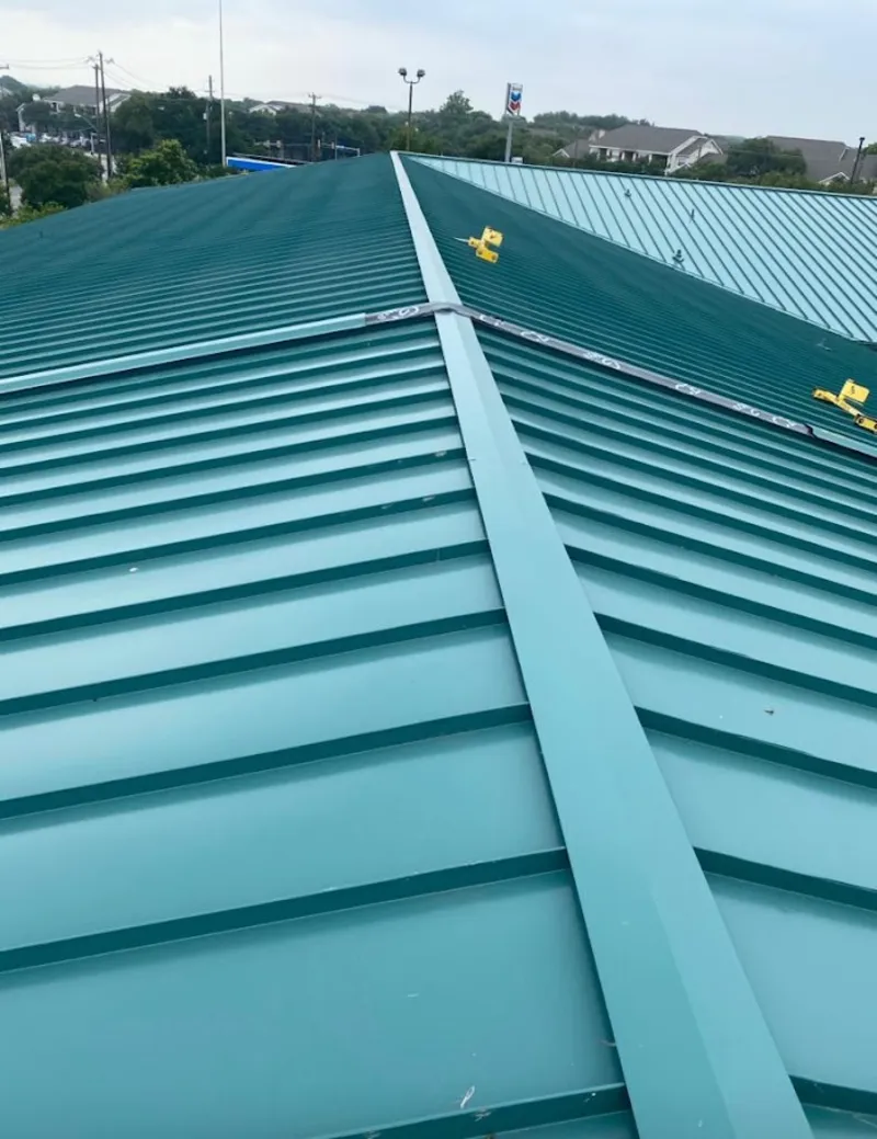 Green commercial metal roof ridge and valley for Metal Roof Repair in Pueblo